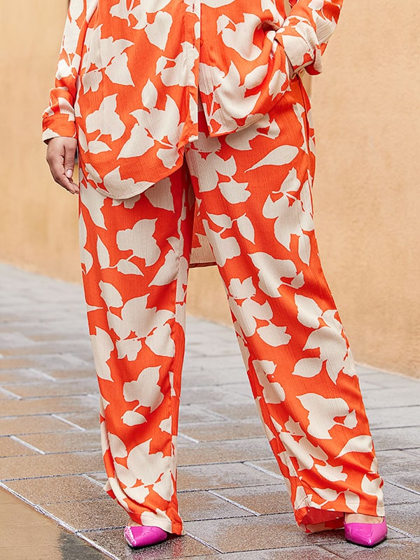 Only Carmakoma EMERSON - Løse orange bukser med beige print , 44